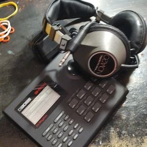 Boss drum machine with headphones
